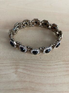 Elegant Gold-Tone Bracelet with Black Gem Accents